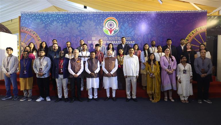 PM in a group photograph during the inauguration of the 18th Pravasi Bharatiya Divas (PBD) convention at Bhubaneswar, in Odisha on January 09, 2025.