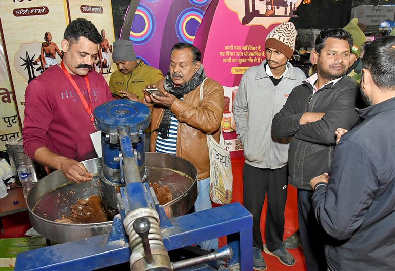 Visitors exploring the Khadi Utsav Exhibition at the Maha Kumbh Mela in Prayagraj, captured on January 17, 2025.:Ministry of Culture