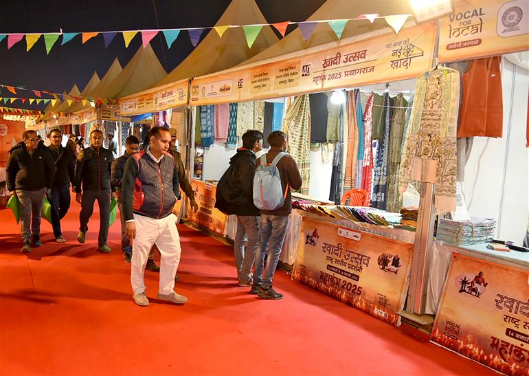 Visitors exploring the Khadi Utsav Exhibition at the Maha Kumbh Mela in Prayagraj, captured on January 17, 2025.:Ministry of Culture