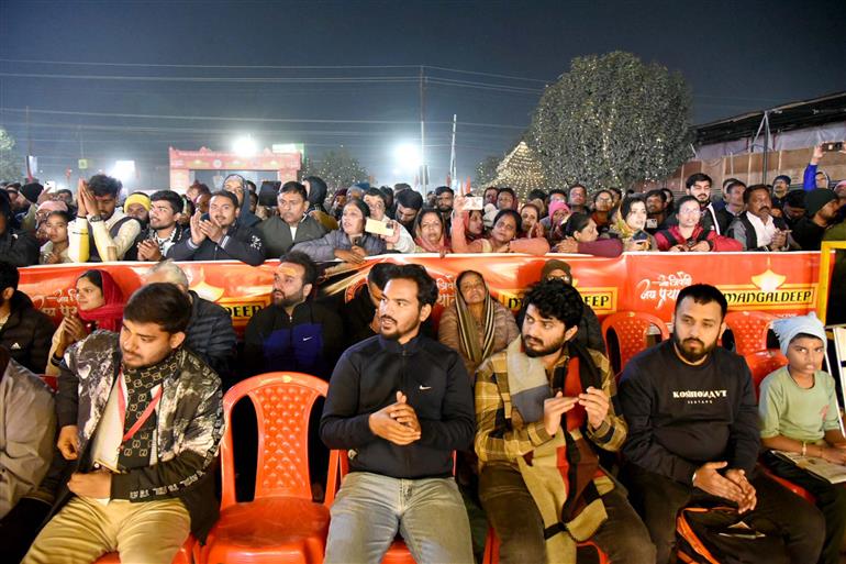 Devotees gather for Ganga Arti at Sthal Sangam, Maha Kumbh Mela at Prayagraj, in Uttar Pradesh on January 18, 2025.:Ministry of Culture