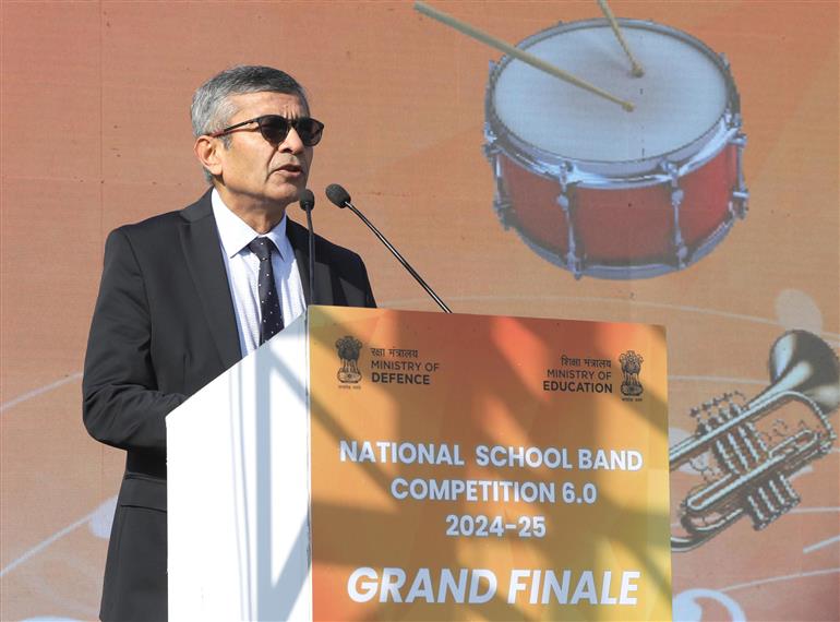 The Defence Secretary, Shri Rajesh Kumar Singh addressing at the Grand Finale of National School Band Competition 6.0 event at Major Dhyan Chand National Stadium, in New Delhi on January 24, 2025.