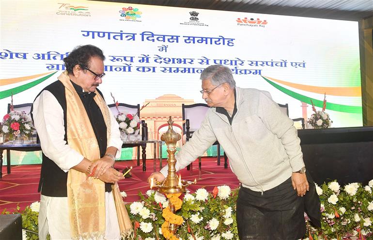 The Union Minister of Panchayati Raj & Fisheries, Animal Husbandry and Dairying, Shri Rajiv Ranjan Singh alias Lalan Singh along with the Minister of State for Fisheries, Animal Husbandry and Dairying & Panchayati Raj, Prof. S. P. Singh Baghel lighting the lamp at the felicitation Function of the Special Guests “Panchayat Leaders” on the Eve of the Republic Day, in New Delhi on January 25, 2025.
