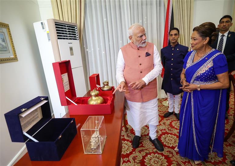 PM exchanges gifts with the Prime Minister of the Republic of Trinidad and Tobago, Ms. Kamla Persad-Bissessar at Port of Spain, in Republic of Trinidad and Tobago on July 03, 2025.:Prime Minister's Office PM exchanges gifts with the Prime Minister of the Republic of Trinidad and Tobago, Ms. Kamla Persad-Bissessar at Port of Spain, in Republic of Trinidad and Tobago on July 03, 2025.:Prime Minister