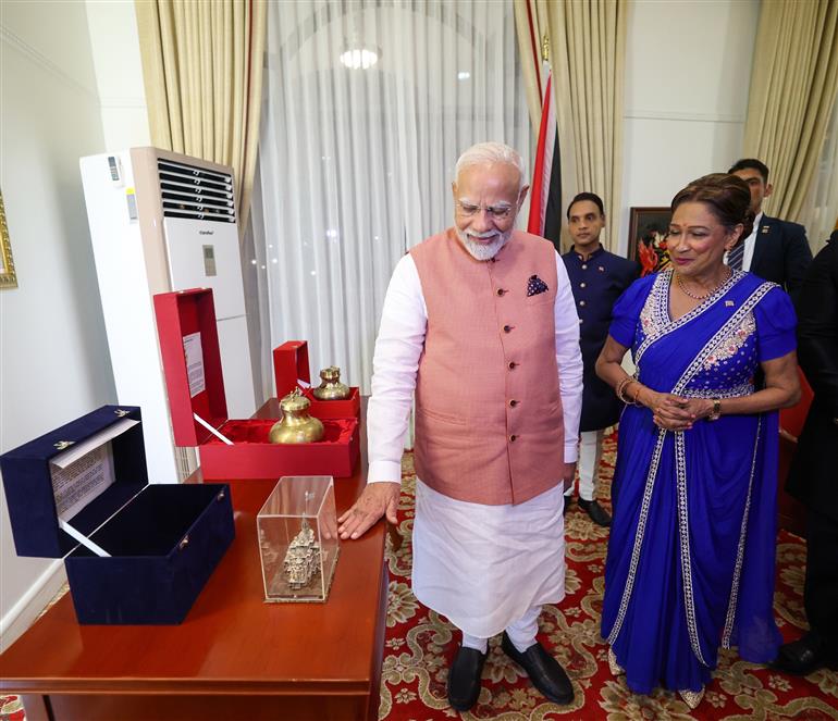 PM exchanges gifts with the Prime Minister of the Republic of Trinidad and Tobago, Ms. Kamla Persad-Bissessar at Port of Spain, in Republic of Trinidad and Tobago on July 03, 2025.:Prime Minister's Office PM exchanges gifts with the Prime Minister of the Republic of Trinidad and Tobago, Ms. Kamla Persad-Bissessar at Port of Spain, in Republic of Trinidad and Tobago on July 03, 2025.:Prime Minister