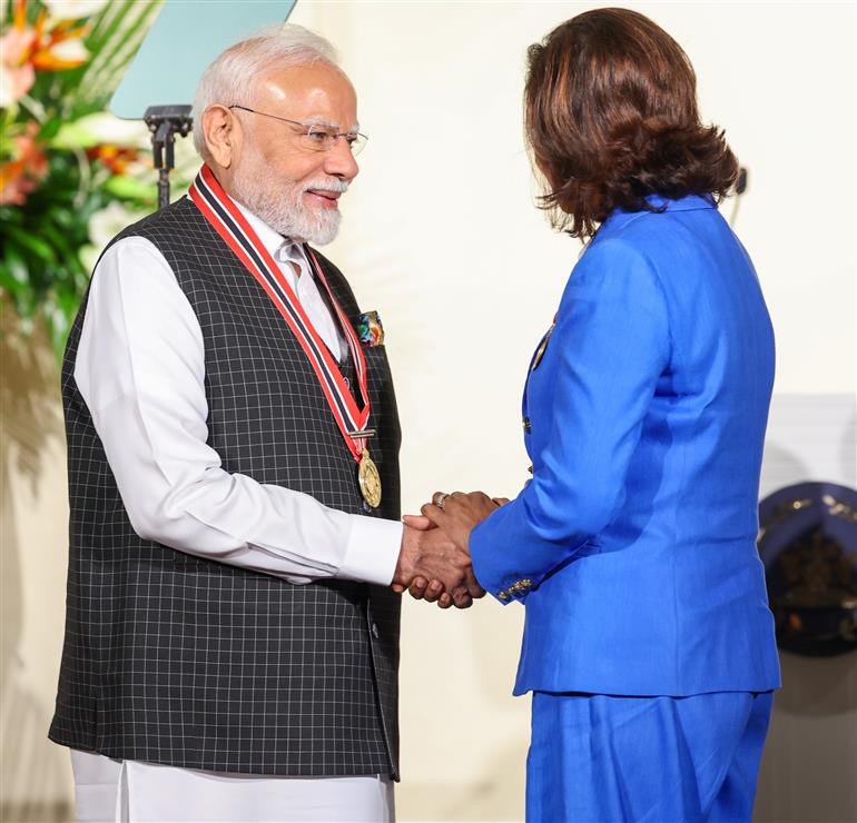 PM receiving the highest national award ‘The Order of the Republic of Trinidad & Tobago’ by the President of the Republic of Trinidad & Tobago, Ms. Christine Carla Kangaloo at Port of Spain, in Republic of Trinidad and Tobago on July 04, 2025.:Prime Minister's Office PM receiving the highest national award ‘The Order of the Republic of Trinidad & Tobago’ by the President of the Republic of Trinidad & Tobago, Ms. Christine Carla Kangaloo at Port of Spain, in Republic of Trinidad and Tobago on July 04, 2025.:Prime Minister