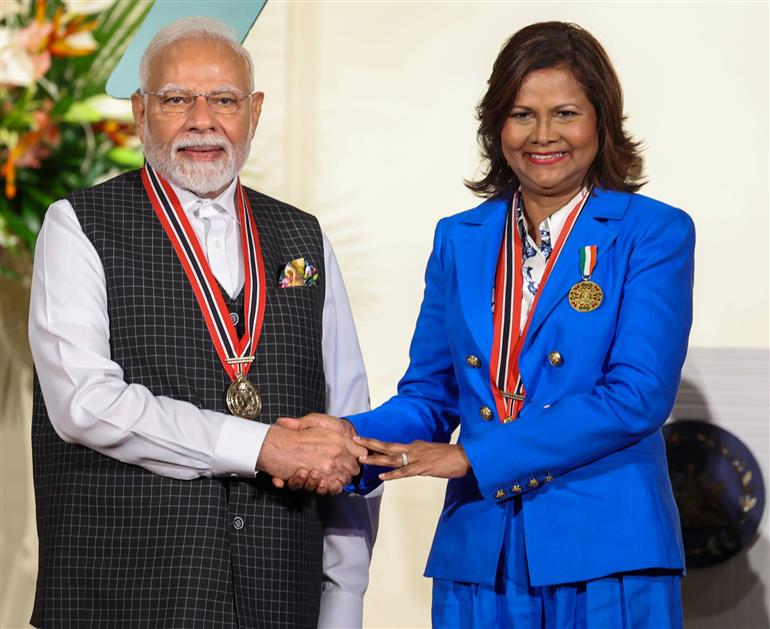 PM receiving the highest national award ‘The Order of the Republic of Trinidad & Tobago’ by the President of the Republic of Trinidad & Tobago, Ms. Christine Carla Kangaloo at Port of Spain, in Republic of Trinidad and Tobago on July 04, 2025.:Prime Minister's Office PM receiving the highest national award ‘The Order of the Republic of Trinidad & Tobago’ by the President of the Republic of Trinidad & Tobago, Ms. Christine Carla Kangaloo at Port of Spain, in Republic of Trinidad and Tobago on July 04, 2025.:Prime Minister