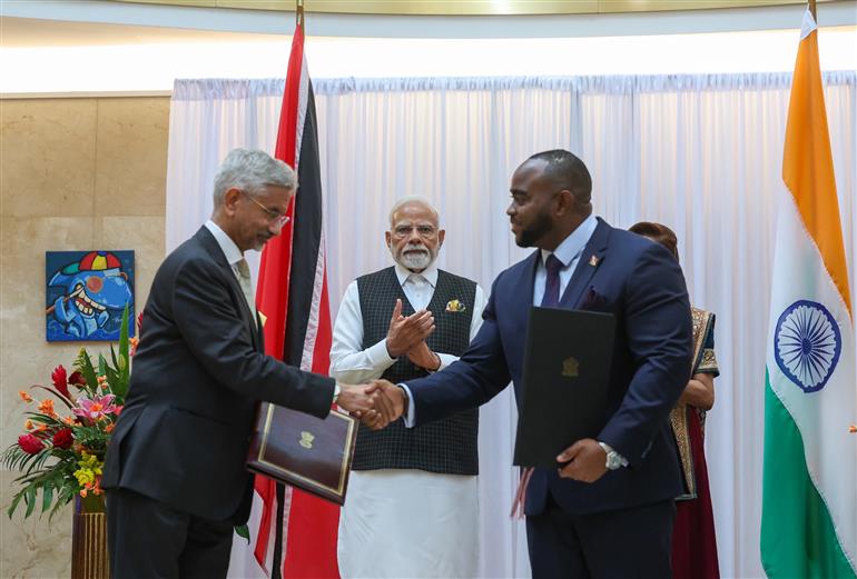 PM and the Prime Minister of the Republic of Trinidad and Tobago, Ms. Kamla Persad-Bissessar witnessing the signing of several MoUs between India and Republic of Trinidad and Tobago at Port of Spain, in Republic of Trinidad and Tobago on July 04, 2025.:Prime Minister's Office PM and the Prime Minister of the Republic of Trinidad and Tobago, Ms. Kamla Persad-Bissessar witnessing the signing of several MoUs between India and Republic of Trinidad and Tobago at Port of Spain, in Republic of Trinidad and Tobago on July 04, 2025.:Prime Minister