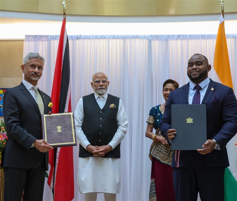 PM and the Prime Minister of the Republic of Trinidad and Tobago, Ms. Kamla Persad-Bissessar witnessing the signing of several MoUs between India and Republic of Trinidad and Tobago at Port of Spain, in Republic of Trinidad and Tobago on July 04, 2025.:Prime Minister's Office PM and the Prime Minister of the Republic of Trinidad and Tobago, Ms. Kamla Persad-Bissessar witnessing the signing of several MoUs between India and Republic of Trinidad and Tobago at Port of Spain, in Republic of Trinidad and Tobago on July 04, 2025.:Prime Minister