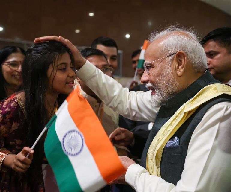PM receives a rousing welcome by Indian community on his arrival at hotel, in Rio De Janeiro, Brazil on July 05, 2025.:Prime Minister's Office PM receives a rousing welcome by Indian community on his arrival at hotel, in Rio De Janeiro, Brazil on July 05, 2025.:Prime Minister