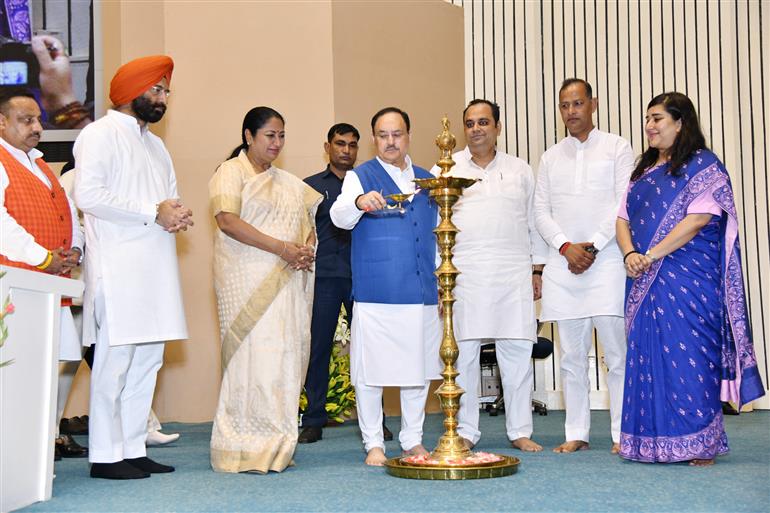 The Union Minister of Health and Family Welfare & Chemicals and Fertilizers, Shri Jagat Prakash Nadda lighting the lamp at the flagging off ceremony of Ayushman Bharat Registration Vans in the presence of Smt. Rekha Gupta, the Chief Minister of Delhi and other dignitaries, in New Delhi on July 06, 2025.
