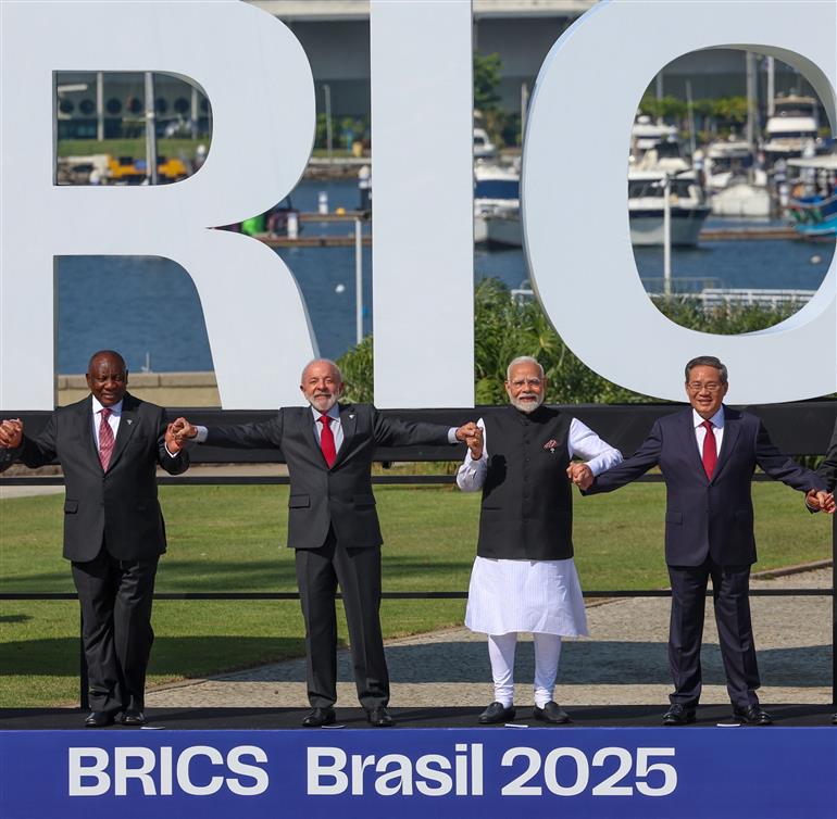 PM in a family photograph with BRICS Members on the sidelines of 17th BRICS Summit at Rio de Janeiro, in Brazil on July 06, 2025.