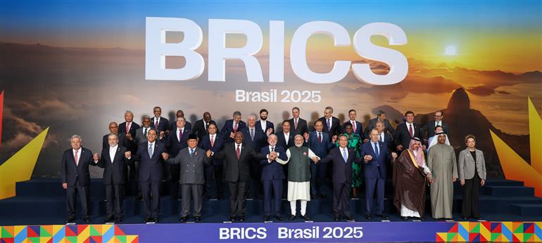 PM in a family photograph with Members, Partners and Outreach invitees on the sidelines of 17th BRICS Summit at Rio de Janeiro, in Brazil on July 07, 2025.