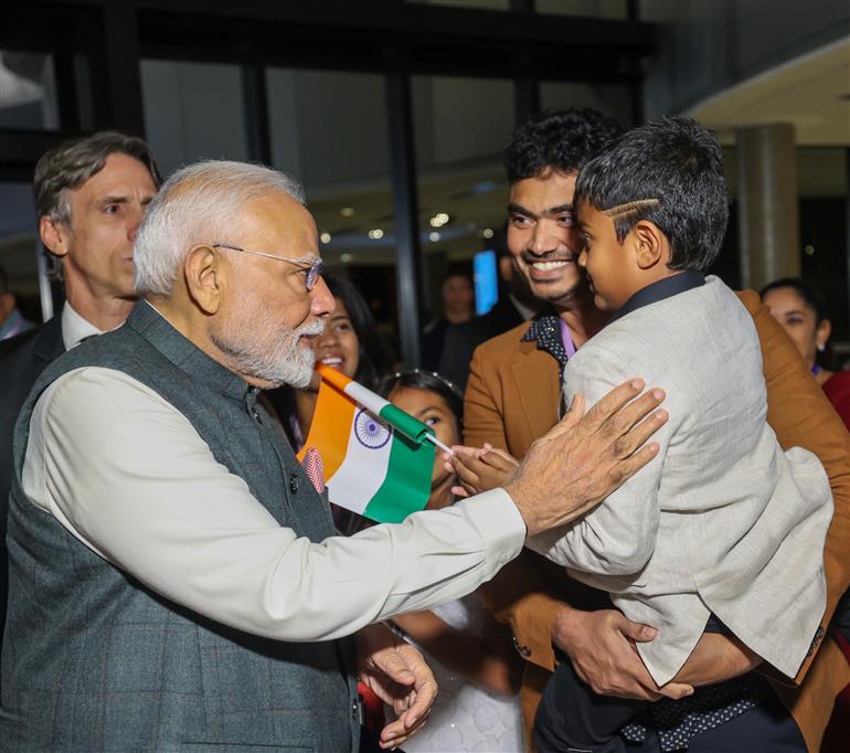 PM receives a rousing welcome by Indian community on his arrival at hotel, in Brasília, in Brazil on July 07, 2025.:Prime Minister's Office PM receives a rousing welcome by Indian community on his arrival at hotel, in Brasília, in Brazil on July 07, 2025.:Prime Minister