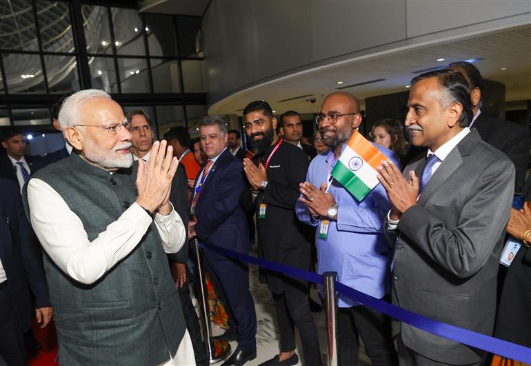 PM receives a rousing welcome by Indian community on his arrival at  hotel, in Brasília, in Brazil on July 07, 2025.