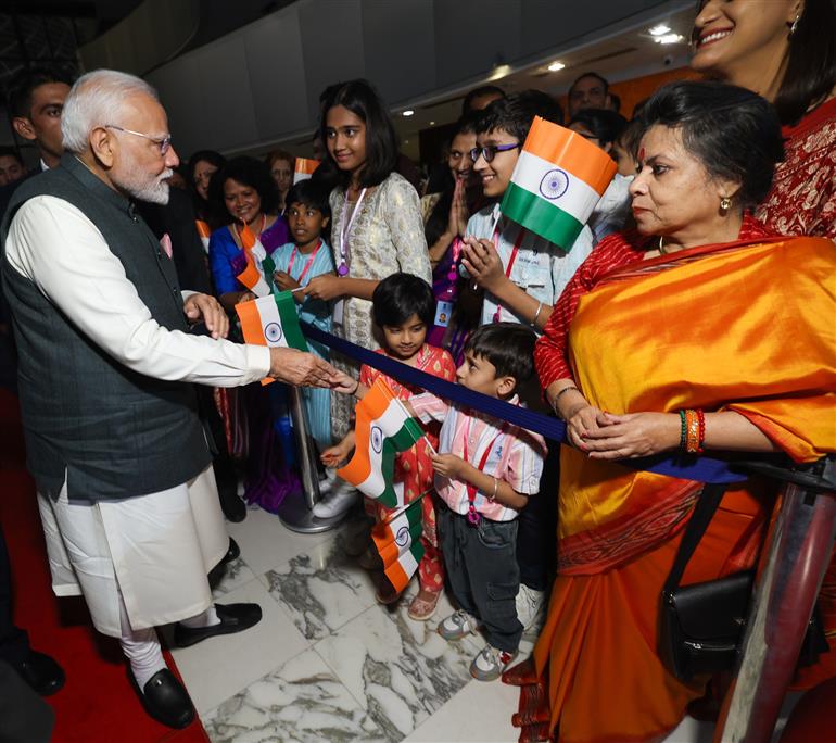 PM receives a rousing welcome by Indian community on his arrival at  hotel, in Brasília, in Brazil on July 07, 2025.