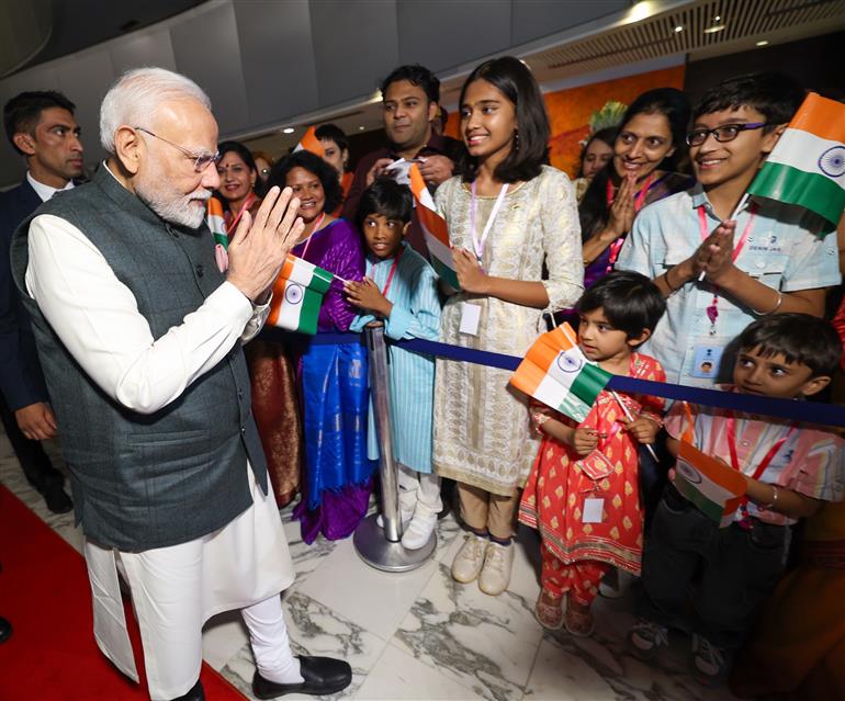 PM receives a rousing welcome by Indian community on his arrival at  hotel, in Brasília, in Brazil on July 07, 2025.