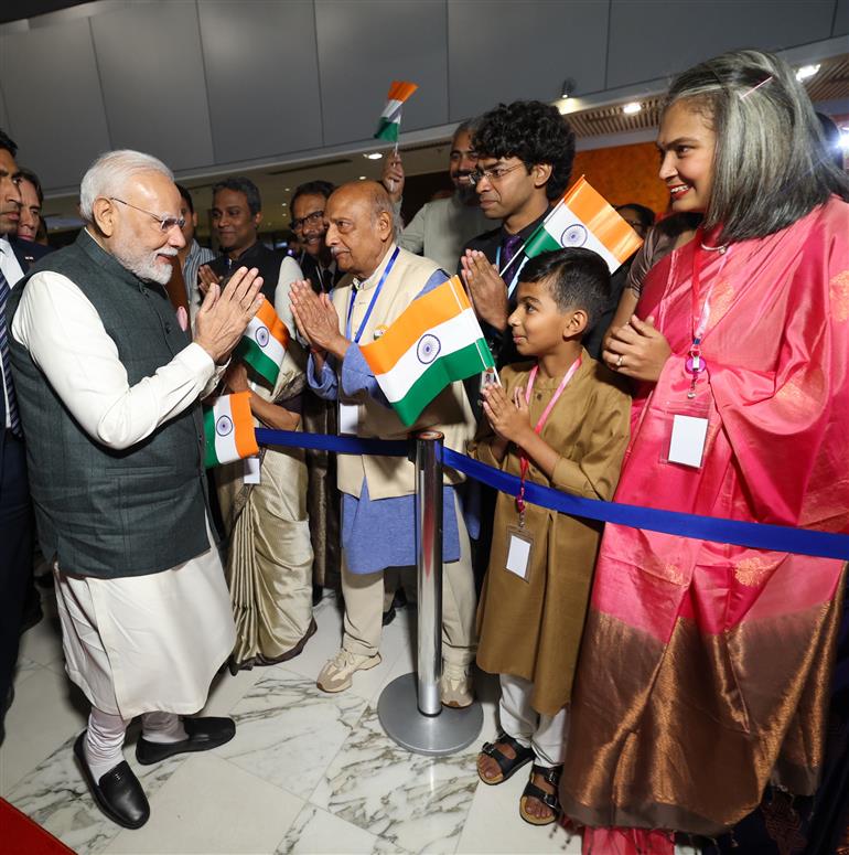 PM receives a rousing welcome by Indian community on his arrival at  hotel, in Brasília, in Brazil on July 07, 2025.