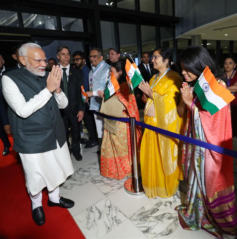 PM receives a rousing welcome by Indian community on his arrival at  hotel, in Brasília, in Brazil on July 07, 2025.