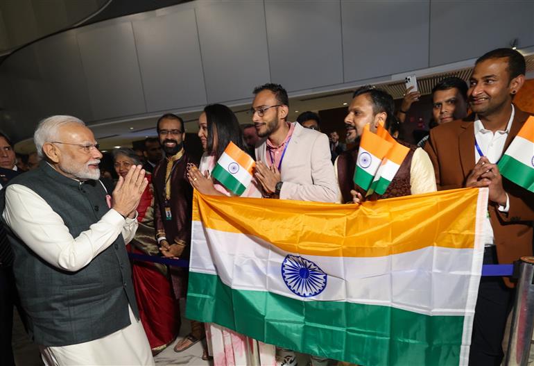 PM receives a rousing welcome by Indian community on his arrival at  hotel, in Brasília, in Brazil on July 07, 2025.
