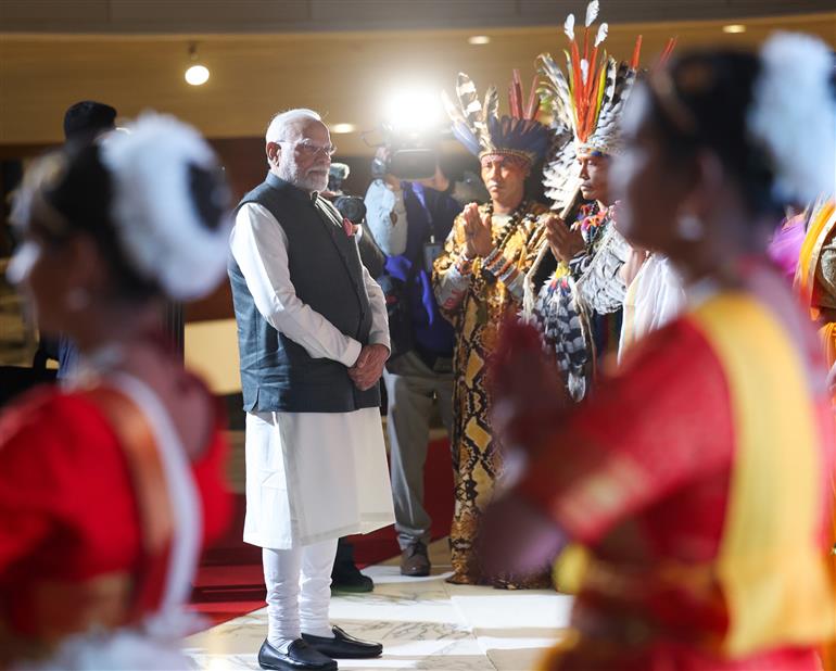 PM receives a cultural welcome by Acharya Jonas Masetti and group on his arrival at  hotel, in Brasília, in Brazil on July 07, 2025.