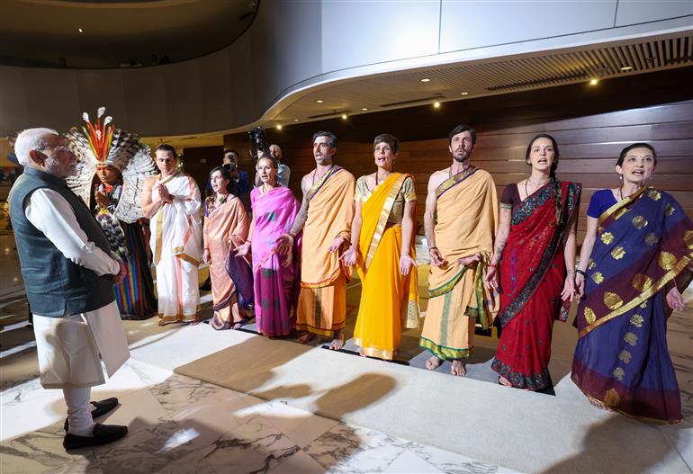 PM receives a cultural welcome by Acharya Jonas Masetti and group on his arrival at  hotel, in Brasília, in Brazil on July 07, 2025.