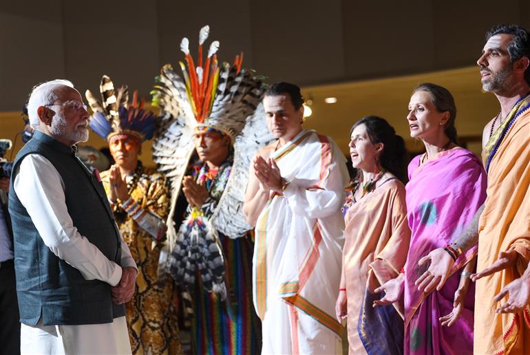 PM receives a cultural welcome by Acharya Jonas Masetti and group on his arrival at  hotel, in Brasília, in Brazil on July 07, 2025.
