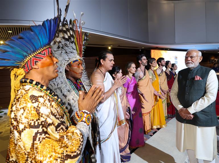 PM receives a cultural welcome by Acharya Jonas Masetti and group on his arrival at  hotel, in Brasília, in Brazil on July 07, 2025.