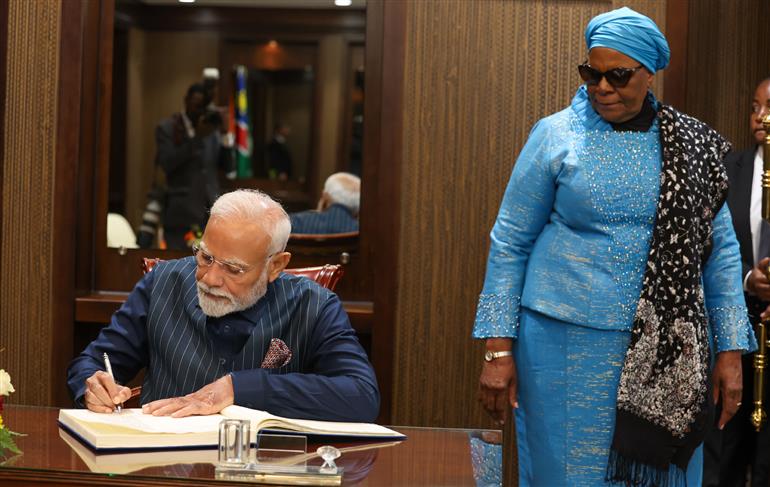 PM writing his remarks in the visitor book in presence of the President of Namibia, Dr. Netumbo Nandi-Ndaitwah at the State House in Windhoek, Namibia on July 09, 2025.:Prime Minister's Office PM writing his remarks in the visitor book in presence of the President of Namibia, Dr. Netumbo Nandi-Ndaitwah at the State House in Windhoek, Namibia on July 09, 2025.:Prime Minister