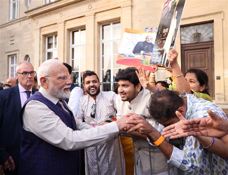 PM receives a rousing welcome by Indian community on his arrival at London, in United Kingdom on July 23, 2025.:Prime Minister's Office PM receives a rousing welcome by Indian community on his arrival at London, in United Kingdom on July 23, 2025.:Prime Minister