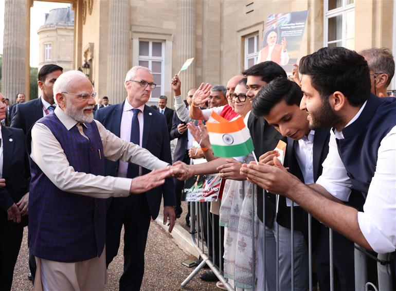 PM receives a rousing welcome by Indian community on his arrival at London, in United Kingdom on July 23, 2025.:Prime Minister's Office PM receives a rousing welcome by Indian community on his arrival at London, in United Kingdom on July 23, 2025.:Prime Minister