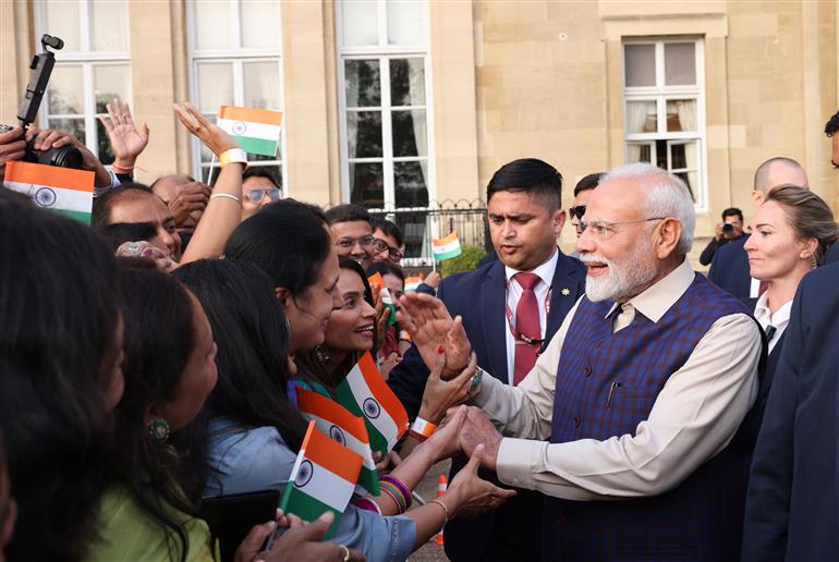 PM receives a rousing welcome by Indian community on his arrival at London, in United Kingdom on July 23, 2025.:Prime Minister's Office PM receives a rousing welcome by Indian community on his arrival at London, in United Kingdom on July 23, 2025.:Prime Minister