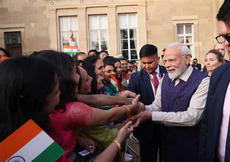 PM receives a rousing welcome by Indian community on his arrival at London, in United Kingdom on July 23, 2025.:Prime Minister's Office PM receives a rousing welcome by Indian community on his arrival at London, in United Kingdom on July 23, 2025.:Prime Minister