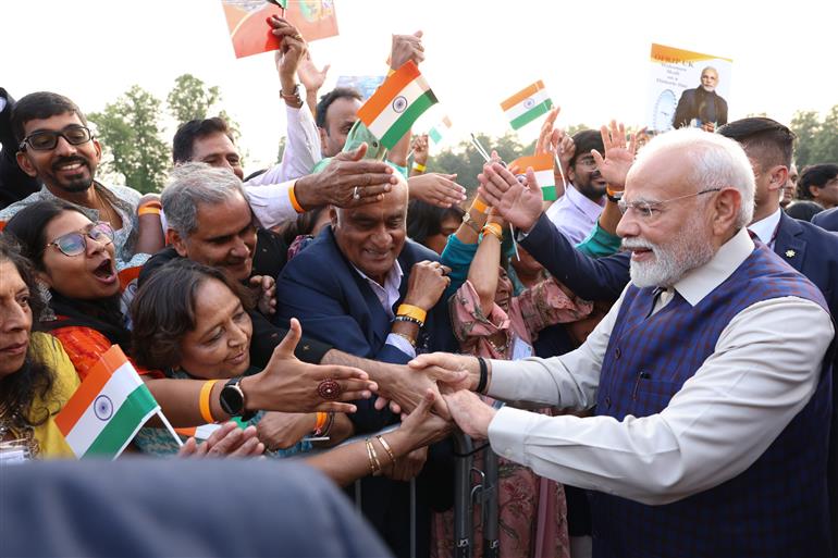 PM receives a rousing welcome by Indian community on his arrival at London, in United Kingdom on July 23, 2025.:Prime Minister's Office PM receives a rousing welcome by Indian community on his arrival at London, in United Kingdom on July 23, 2025.:Prime Minister