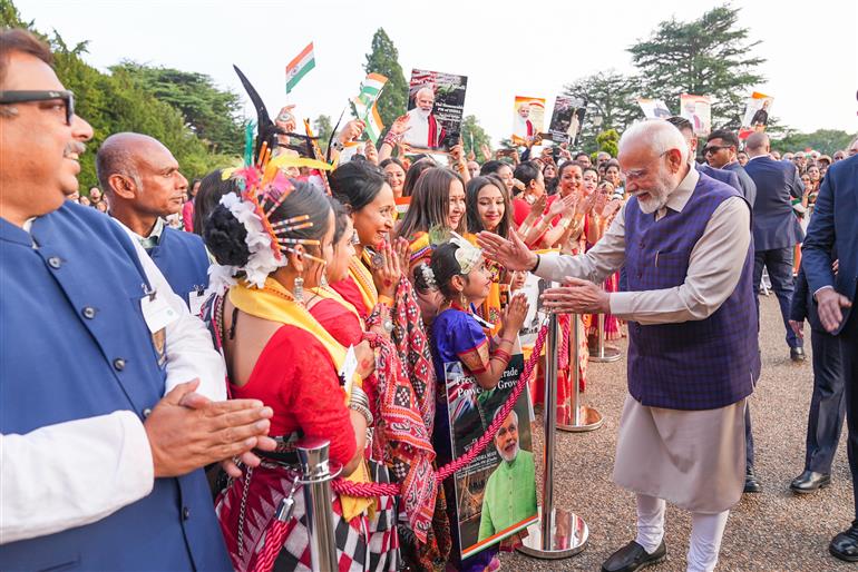 PM receives a rousing welcome by Indian community on his arrival at London, in United Kingdom on July 23, 2025.:Prime Minister's Office PM receives a rousing welcome by Indian community on his arrival at London, in United Kingdom on July 23, 2025.:Prime Minister