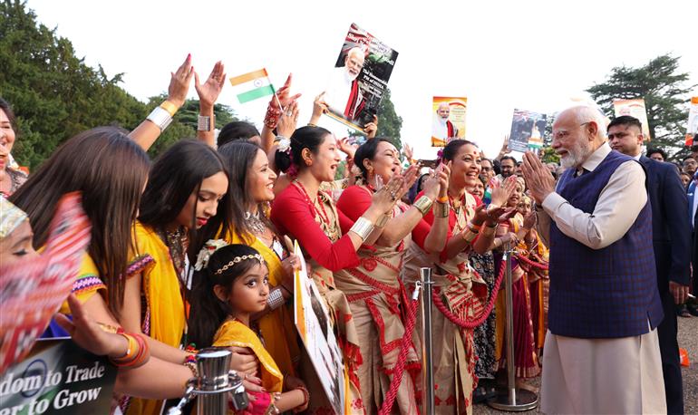 PM receives a rousing welcome by Indian community on his arrival at London, in United Kingdom on July 23, 2025.:Prime Minister's Office PM receives a rousing welcome by Indian community on his arrival at London, in United Kingdom on July 23, 2025.:Prime Minister