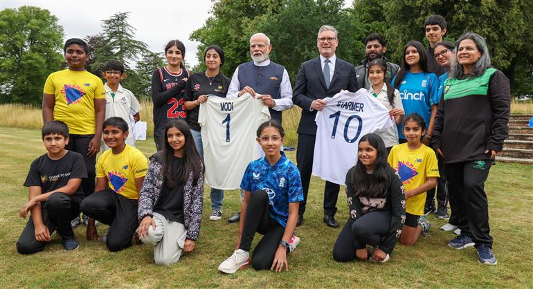 PM and the Prime Minister of the United Kingdom, Mr. Keir Starmer interaction with members of the ‘Buckingham Street Cricket Hub’ in London, England on July 24, 2025.:Prime Minister's Office PM and the Prime Minister of the United Kingdom, Mr. Keir Starmer interaction with members of the ‘Buckingham Street Cricket Hub’ in London, England on July 24, 2025.:Prime Minister