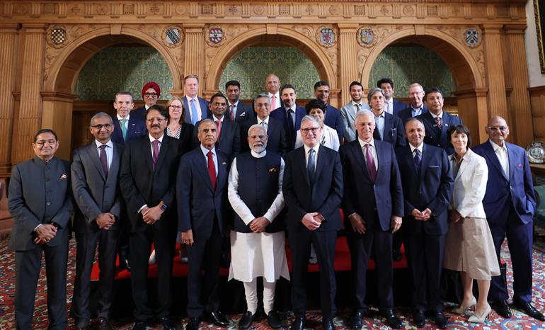 PM and the Prime Minister of the United Kingdom, Mr. Keir Starmer in a group photograph with business leaders during the business event at London, in England on July 24, 2025.:Prime Minister's Office PM and the Prime Minister of the United Kingdom, Mr. Keir Starmer in a group photograph with business leaders during the business event at London, in England on July 24, 2025.:Prime Minister