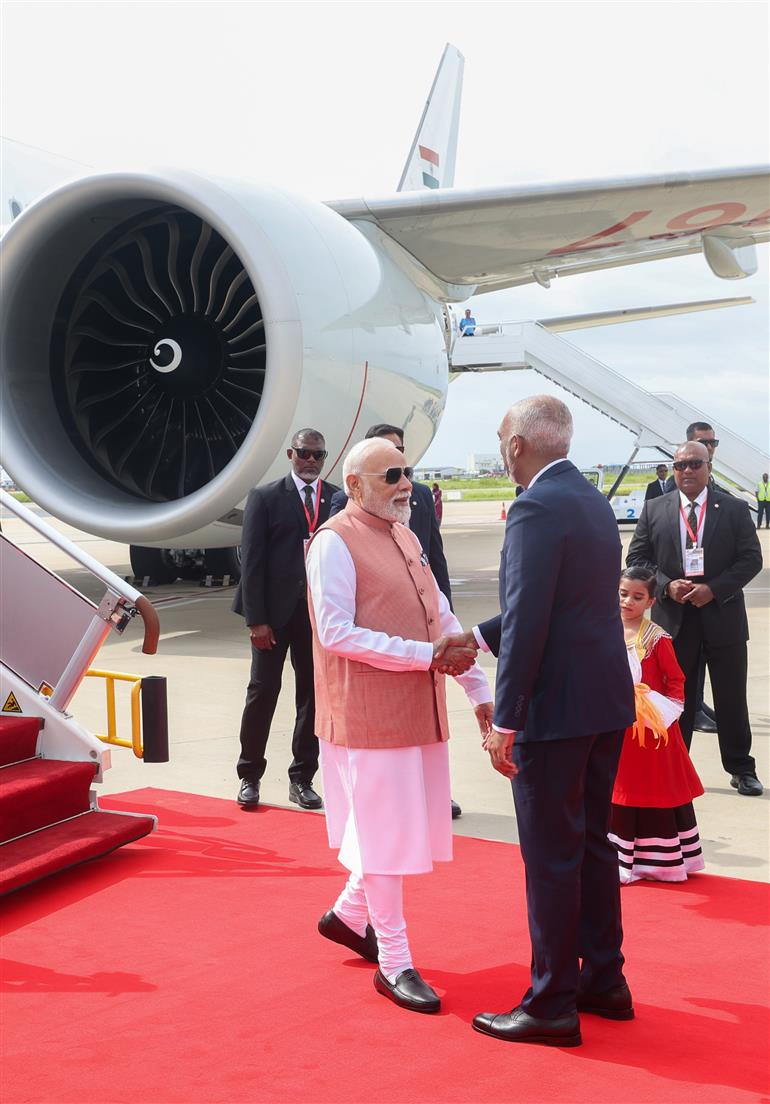 PM receives a warm welcome by the President of Maldives, Dr. Mohamed Muizzu on his arrival at Malé, in Maldives on July 25, 2025.:Prime Minister's Office PM receives a warm welcome by the President of Maldives, Dr. Mohamed Muizzu on his arrival at Malé, in Maldives on July 25, 2025.:Prime Minister