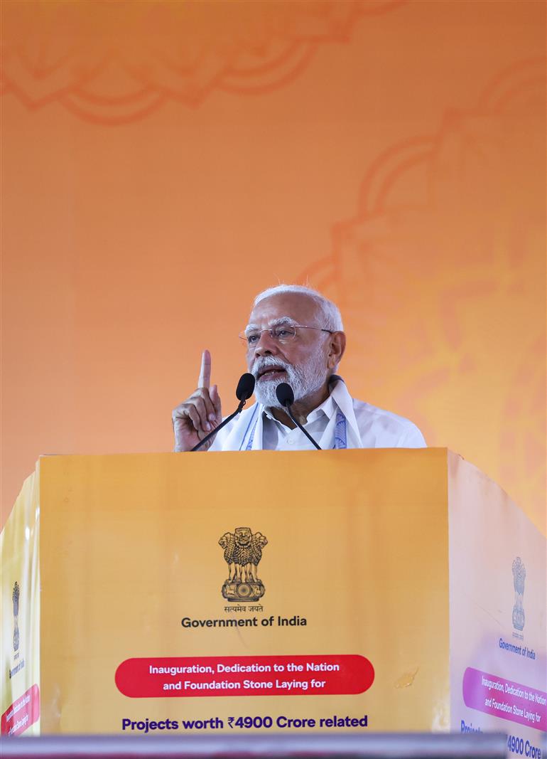 PM addressing the gathering at public event on the sidelines of the foundation stone laying,  dedication and inauguration of various Development Projects to the nation at Tuticorin, in Tamil Nadu on July 26, 2025.