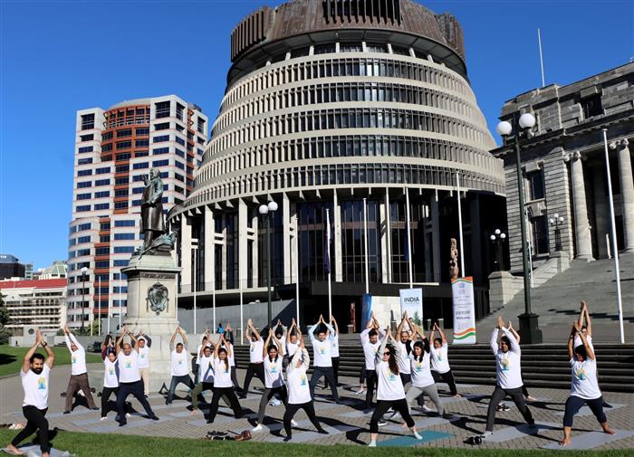 Countdown Begins for the 11th IDY 2025 under theme “Yoga for One Earth, One Health.” HCI and UNANZ, hosted a special yoga session on grounds of iconic Parliament of New Zealand (Beehive), on June 02, 2025.:AYUSH