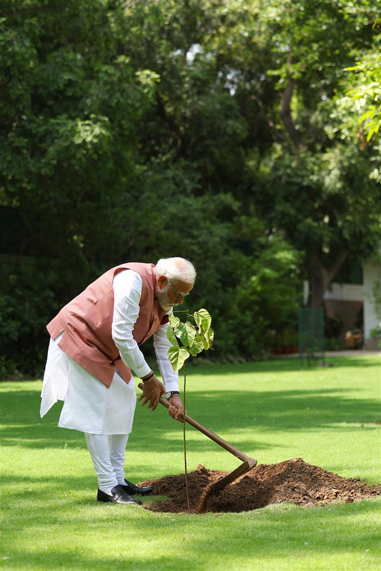 PM planting a sapling to mark the World Environment Day-2025 at his residence (7, Lok Kalyan Marg), in New Delhi on June 05, 2025.