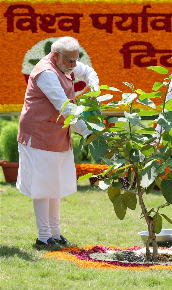 PM planting a sapling under the ‘Ek Ped Maa Ke Naam’ initiative on auspicious occasion of World Environment Day-2025 at Bhagwan Mahavir Vanasthali Park, in New Delhi on June 05, 2025.