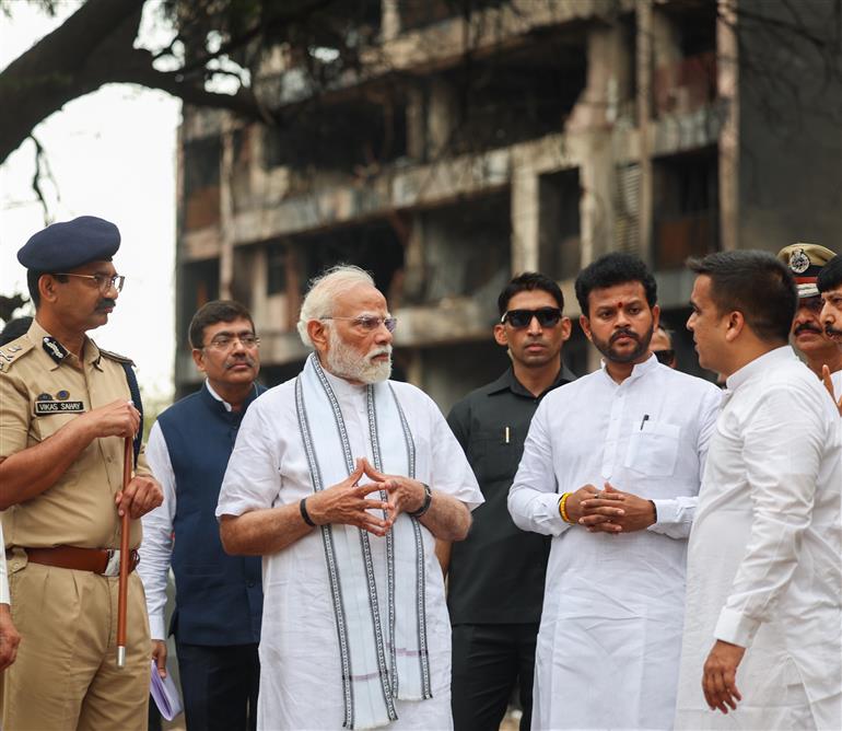 PM visits a crash site of the AI-171 flight that met with an accident at Ahmedabad, in Gujarat on June 13, 2025.