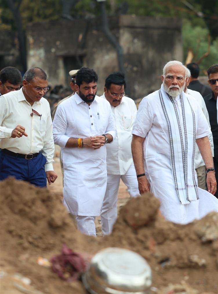 PM visits a crash site of the AI-171 flight that met with an accident at Ahmedabad, in Gujarat on June 13, 2025.