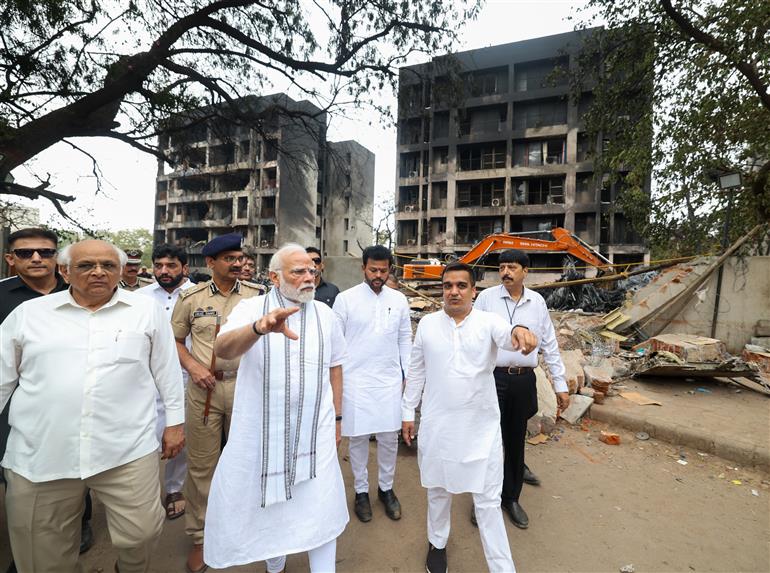 PM visits a crash site of the AI-171 flight that met with an accident at Ahmedabad, in Gujarat on June 13, 2025.