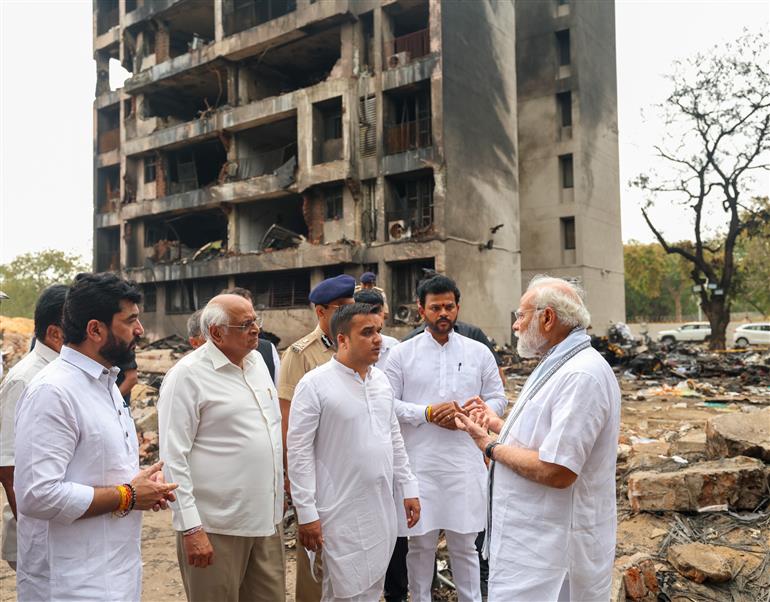 PM visits a crash site of the AI-171 flight that met with an accident at Ahmedabad, in Gujarat on June 13, 2025.