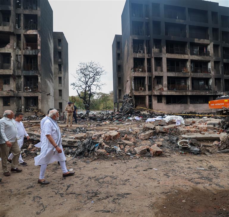 PM visits a crash site of the AI-171 flight that met with an accident at Ahmedabad, in Gujarat on June 13, 2025.