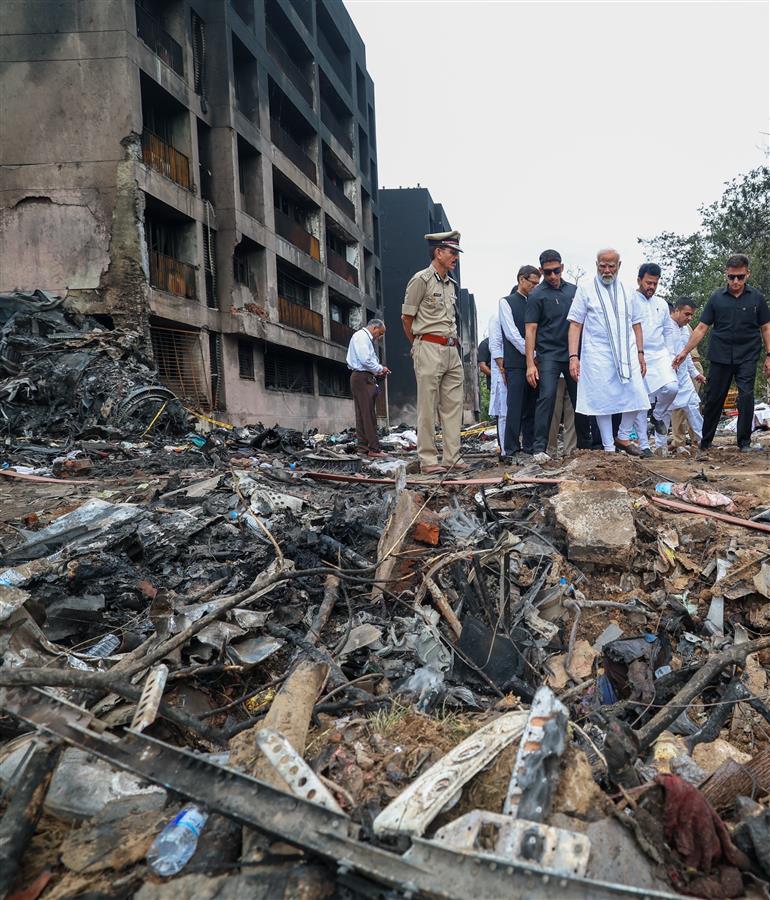 PM visits a crash site of the AI-171 flight that met with an accident at Ahmedabad, in Gujarat on June 13, 2025.