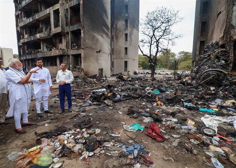 PM visits a crash site of the AI-171 flight that met with an accident at Ahmedabad, in Gujarat on June 13, 2025.