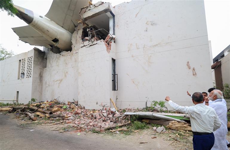 PM visits a crash site of the AI-171 flight that met with an accident at Ahmedabad, in Gujarat on June 13, 2025.
